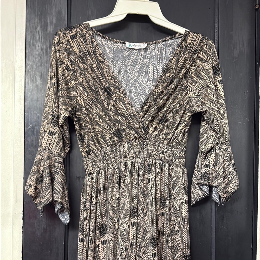 Elegant Black and Cream Patterned Dress